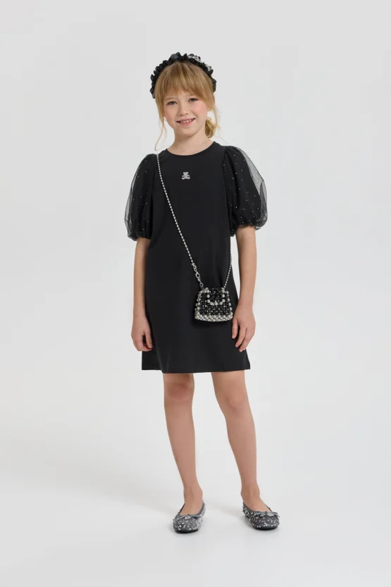 Հագնվեք ձեռքի պայուսակի հետ